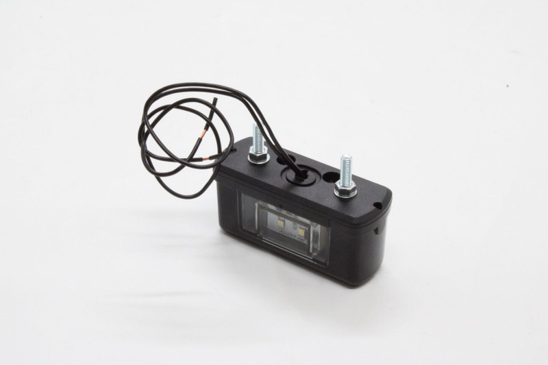 0023717 Фонарь подсветки номерного знака — 1