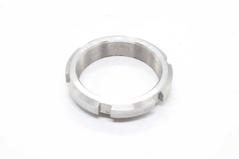 2052570854 Гайка стопорная ступ. б.ш. — 2